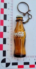 Porte clés coca d'occasion  Marigny-le-Châtel