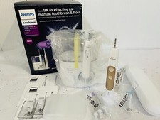 Philips Sonicare Power sistema de hilo dental y cepillo de dientes 7000 HX3921/40 nueva caja abierta segunda mano  Embacar hacia Mexico