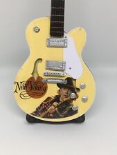 Mini guitare bois d'occasion  Pommeuse