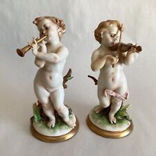 2 estatuetas finas antigas de porcelana Capodimonte Putti querubim estilo capa comprar usado  Enviando para Brazil