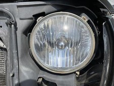 Used left headlight d'occasion  Expédié en Belgium