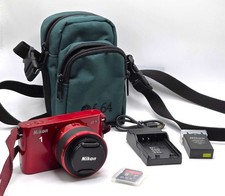 Câmera Digital Nikon 1 J1 10.1 MP Vermelha com Carregador/Acessórios/Saco TESTADO (A9) comprar usado Câmera Digital Nikon 1 J1 10.1 MP Vermelha com Carregador/Acessórios/Saco TESTADO (A9) comprar usado  Enviando para Brazil