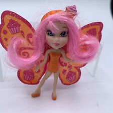 Mini boneca 2,5" cabelo rosa cupcake asas de borboleta laranja fada 2004 Mattel comprar usado  Enviando para Brazil