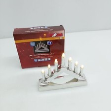 hellum, świecznik LED, łuk obrotowy, plastik, srebrny, 7 ciepłych białych diod LED na sprzedaż  PL