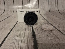 Câmera Digital Nikon 1 J1 10.1MP com Lente 10-30mm - Full HD 1080p - Branca comprar usado Câmera Digital Nikon 1 J1 10.1MP com Lente 10-30mm - Full HD 1080p - Branca comprar usado  Enviando para Brazil