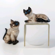 Conjunto de duas estatuetas de cerâmica família gato siamês com olhos azuis vintage retrô  comprar usado  Enviando para Brazil