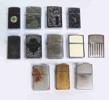 LOTE de DOZE (12) tipos sortidos de isqueiros ZIPPO, incluindo alguns primeiros comprar usado  Enviando para Brazil
