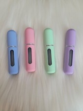 Four refillable portable for sale  Davenport