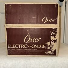 Olla de fondue eléctrica Oster retro amarilla con 14 tenedores de fondue NOS de colección segunda mano  Embacar hacia Mexico