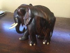 Estatueta de arte popular de elefante africano esculpida em madeira de ébano sólida presas de celulóide vintage comprar usado  Enviando para Brazil