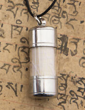 Amulette pendentif rouleau d'occasion Amulette pendentif rouleau d'occasion  Ardres
