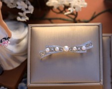 Broche agenté noeud d'occasion  Paris VI