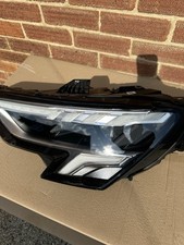 Audi left headlight for sale  READING