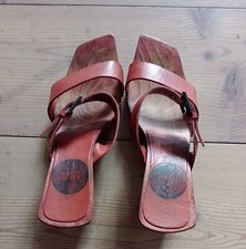 Zoccoli legno. colore usato  Meran