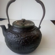 Théière ronde fer d'occasion  Expédié en France