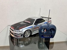 Carro Nikko GT-R R34 controlado por rádio prata comprar usado  Enviando para Brazil