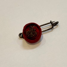 Reminder. butonniere rosette. d'occasion  Expédié en Belgium