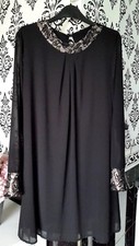 Robe noire encolure d'occasion  Grisy-Suisnes