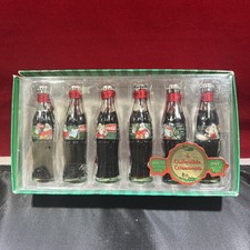 EVOLUTION OF THE COCA COLA SANTA 6 ENFEITES COLECIONÁVEIS DE GARRAFA DE COCA SÉRIE UM, usado comprar usado EVOLUTION OF THE COCA COLA SANTA 6 ENFEITES COLECIONÁVEIS DE GARRAFA DE COCA SÉRIE UM, usado comprar usado  Enviando para Brazil