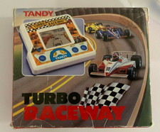 Jogo de arcade portátil retrô Tandy Turbo Raceway na caixa original testado funcionando, usado comprar usado  Enviando para Brazil