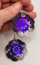 Orecchini fiore viola usato  Roma