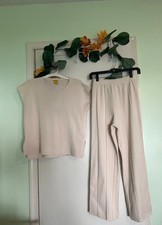 Conjunto lounge feminino de malha margarida tamanho M bege sem mangas calça perna larga 2 peças mínimas comprar usado  Enviando para Brazil