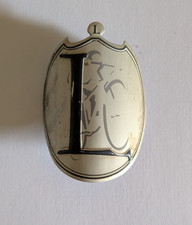 Badge logo tête d'occasion  Laignes
