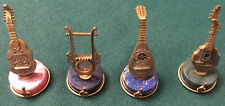Quattro miniature strumenti usato  Roma