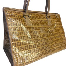 Bolsa tote Fendi estampa logotipo marrom acabamento brilhante couro sintético usada Japão comprar usado Bolsa tote Fendi estampa logotipo marrom acabamento brilhante couro sintético usada Japão comprar usado  Enviando para Brazil