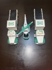 Caminhões a gasolina Hess 1991 conjunto de 2 e helicóptero sem caixa comprar usado Caminhões a gasolina Hess 1991 conjunto de 2 e helicóptero sem caixa comprar usado  Enviando para Brazil