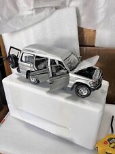 Carro Mitsubishi Pajero modelo prata fundido escala 1:18 comprar usado  Enviando para Brazil