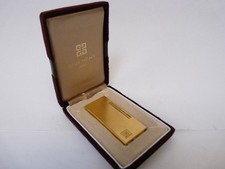 Givenchy gas lighter d'occasion  Expédié en Belgium