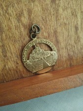 Médaille porte clés d'occasion  Saint-Léonard-de-Noblat