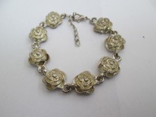 PULSEIRA CORRENTE PADRÃO FLOR PRATA/OURO comprar usado PULSEIRA CORRENTE PADRÃO FLOR PRATA/OURO comprar usado  Enviando para Brazil