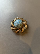 Broche fantaisie doré d'occasion  La Ferté-Gaucher