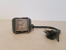 MONTRE DE SAC . DE VOYAGE ETUI EN CUIR  VERT.SIGNEE UTI. FAB SUISSE, usado comprar usado  Enviando para Brazil