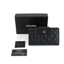 Cartera plegable Chanel de cuero de cordero negra con símbolos preciosos #H130823-1 segunda mano  Embacar hacia Argentina