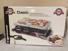 Parrilla de raclette Swissmar Classic para 8 personas con piedra de granito, roja segunda mano  Embacar hacia Mexico