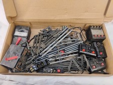 Caja de piezas y accesorios de modelismo ferroviario vintage interruptores de vía transformadores segunda mano  Embacar hacia Mexico