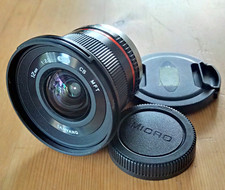 Lente de câmera Samyang 12mm f/2 NCS CS foco manual ultra amplo para montagem MFT + tampas comprar usado  Enviando para Brazil