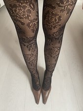 Collant floreale nero usato  Verona