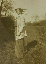 Woman holding stick for sale  Foley