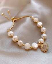 Bracelet femme doré d'occasion  Artix