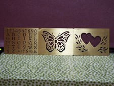 Three brass stencils for sale  LLANFECHAIN