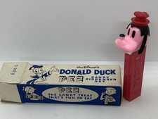 Vintage Disney PEZ Goofy pink face, no feet dispenser with vending box, rare comprar usado  Enviando para Brazil