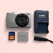 Sale canon ixus d'occasion  Expédié en Belgium