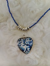 Collier lapin bleu d'occasion  Montbazens
