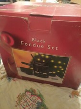 Conjunto de fondue preto.  comprar usado Conjunto de fondue preto.  comprar usado  Enviando para Brazil