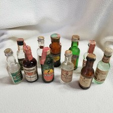 Lote de 11 mini garrafas de licor de uísque vintage em miniatura vazias para companhias aéreas com gin vodka comprar usado Lote de 11 mini garrafas de licor de uísque vintage em miniatura vazias para companhias aéreas com gin vodka comprar usado  Enviando para Brazil