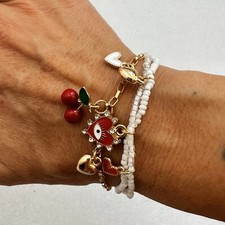 Set ciliegie bracciali usato  Cagliari